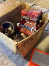 Box with rocks and a rock Tumbler