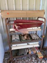 Metal shelf with contents, light bulbs, gardening items, grow light and other items Buyer must bring