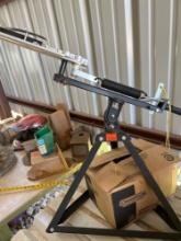 Clay pigeon skeet thrower with box of skeets