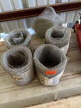 Four rolls of aluminum gutter guard