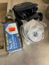 Box of envelopes, binoculars, and miscellaneous items