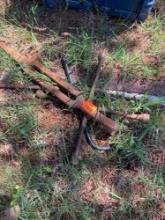 Crow bar, 4 way tire iron, and unknown item
