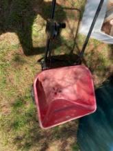 Walk behind yard seeder