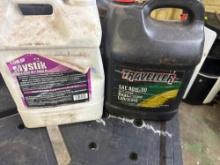 Mystic oil And container of motor oil two times the money