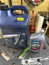 Two containers of motor oil