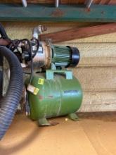 Well pump and tank with pressure control switch