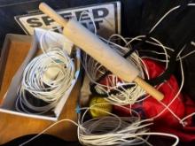 Various cords, desk paper organizers, softball, signs, rolling pin and more