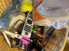 Wicker basket with misc items, scissors, remote, super glue, locks, glue sticks and more