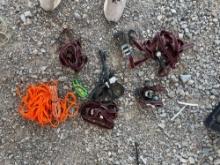 Basket with ratchet straps, rope and other items