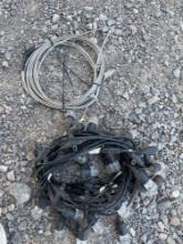 Roll of cable and a strand of outdoor lights
