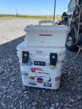 Yeti cooler and plastic ammo can