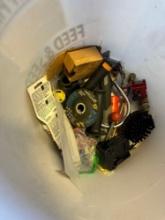 Lot contains battery charger, cut off wheel, and other various items