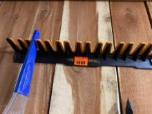 Wall organizer for wall hung tools