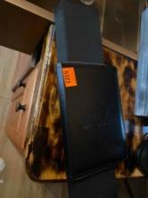 Vizio sound bar and leather folder