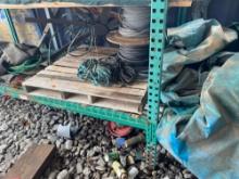 All items oh shelf, rope, cable, large fan blades, and other items