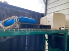 All items on shelf water tank, hose and more