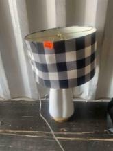 White lamp with checkard lamp shade