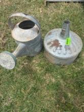 Galvanized watering can with a vintage funnel