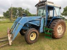 1978 Ford 7000 tractor. With bucket and extra tires on wheels, 4036 hours with pto shaft for