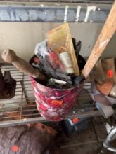 Miscellaneous items in tin bucket