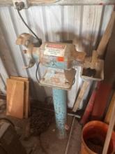 Industrial grinder on pedestal