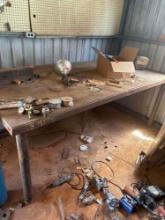 No contents 49x97 in metal shop table. BUYER MUST REMOVE BRING HELP