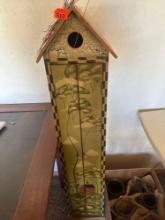 Bird feeder shelf cabinet with cds and tapes