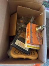 Box with various glass items and playing cards other items