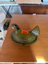 green glass chicken serving dish