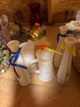 milk glasses and candle holders