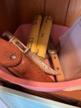 Knifes and shelf in container
