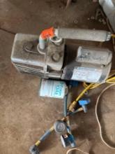 Vacuum pump small can new 134a two gauges