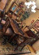 Dinner Tableonly 8 matching chairswith leaf comes with felt table protector Please bring help to