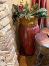 Large ceramic urn with floral arrangement