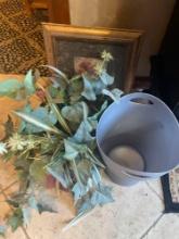 Trash bin, artificial floral plant, floral photo frame and stand