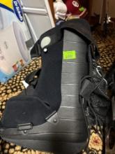 walking boot and a knee brace