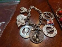 Charm bracelet, pierced earrings