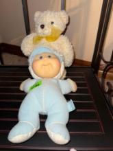 Cabbage patch doll and teddy bear