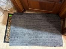 Bathroom rugs and trash can
