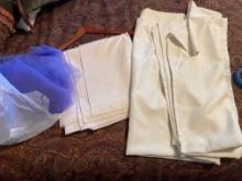 Ivory table cloths and purple tulle