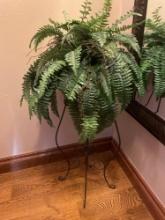 Artificial plant in woven plant stand