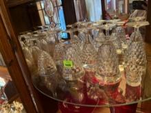 8 glass cups and tooth pick holder