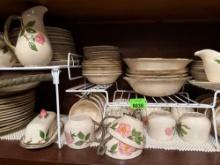 Plates, cups, bowls, butter holder all matching set