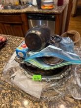 silver dishes and cleaner