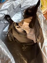 sack of mens shorts and jeans