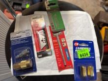 hex connector, drillbit, utility knife blades, and a coupler plug kit
