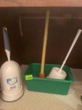 2 toilet bowl brushes, plunger, and green tub