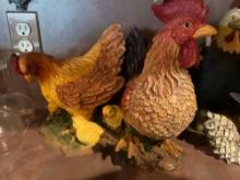 2 chicken decor statues, a hen with chicks and rooster