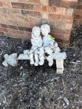 girl and boy yard decor