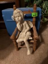 Girl on a seat, and box